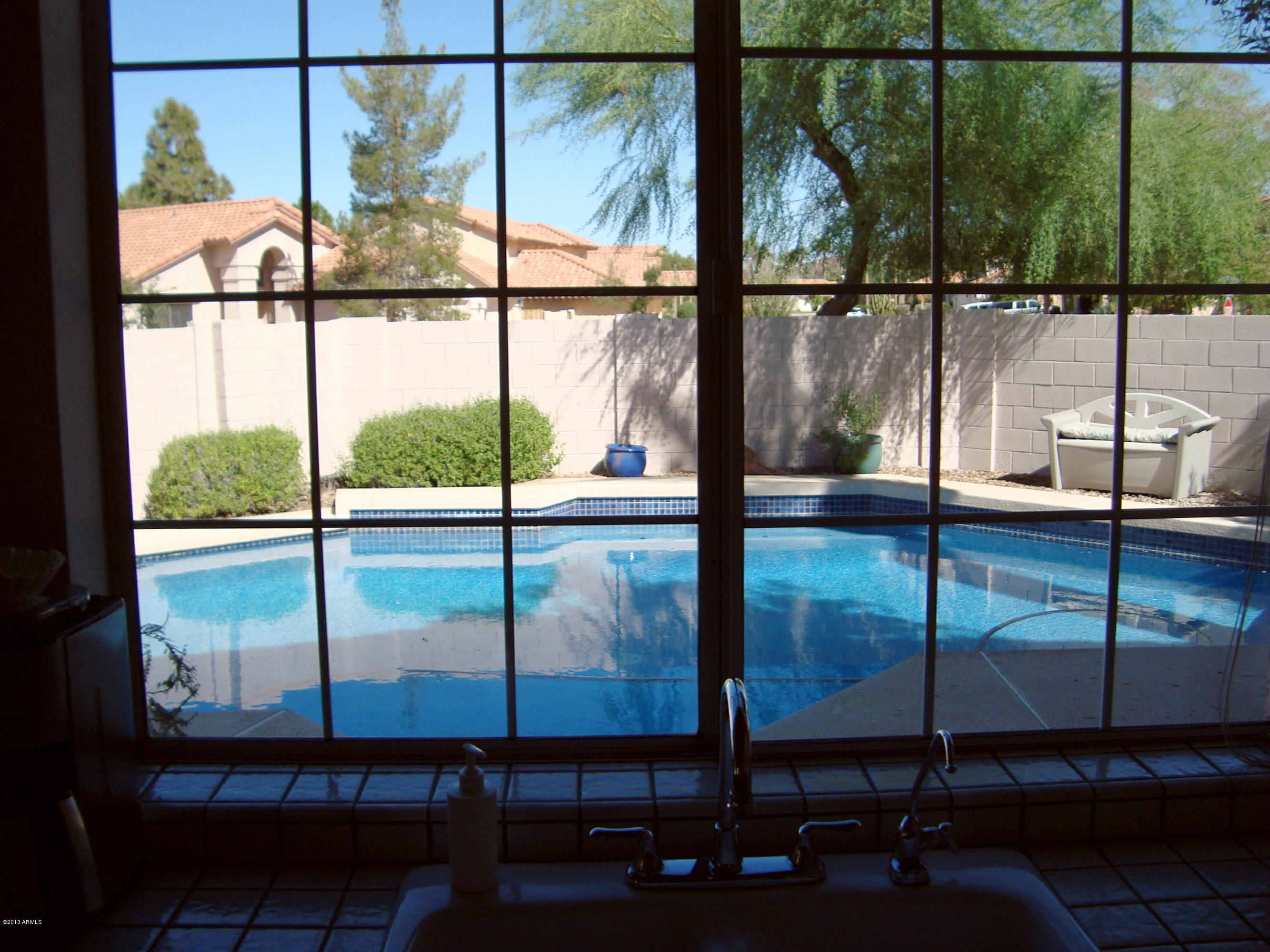 3322 East Rock Wren Road Phoenix, AZ 85044 - Photo 18 of 24 21 Rock Wren Pool From Kitchen