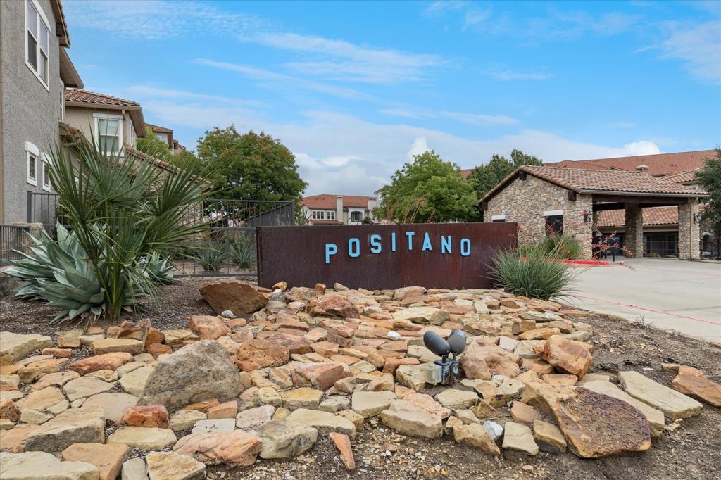 610 Via Ravello, Unit 410 Irving, TX 75039 - Photo 27 of 28 a front view of a house with a yard