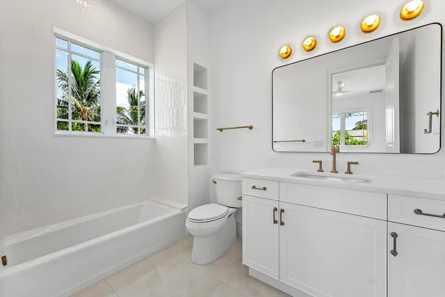 a view of a swimming pool with an outdoor space and seating area