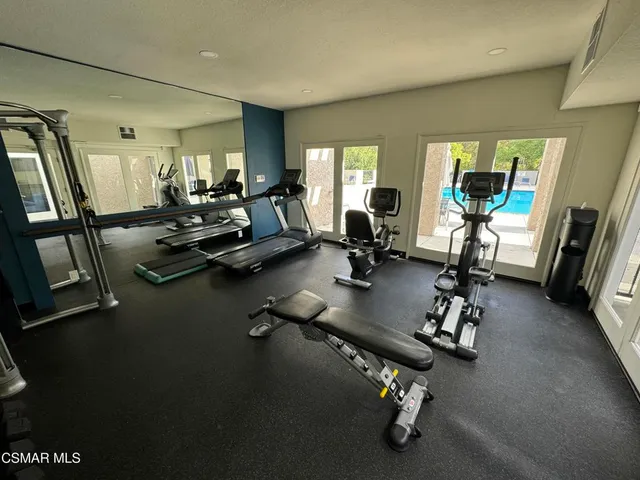 an aerial view of a house with yard swimming pool and outdoor seating