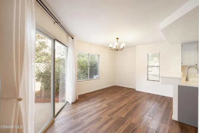 a view of a livingroom with a staircase