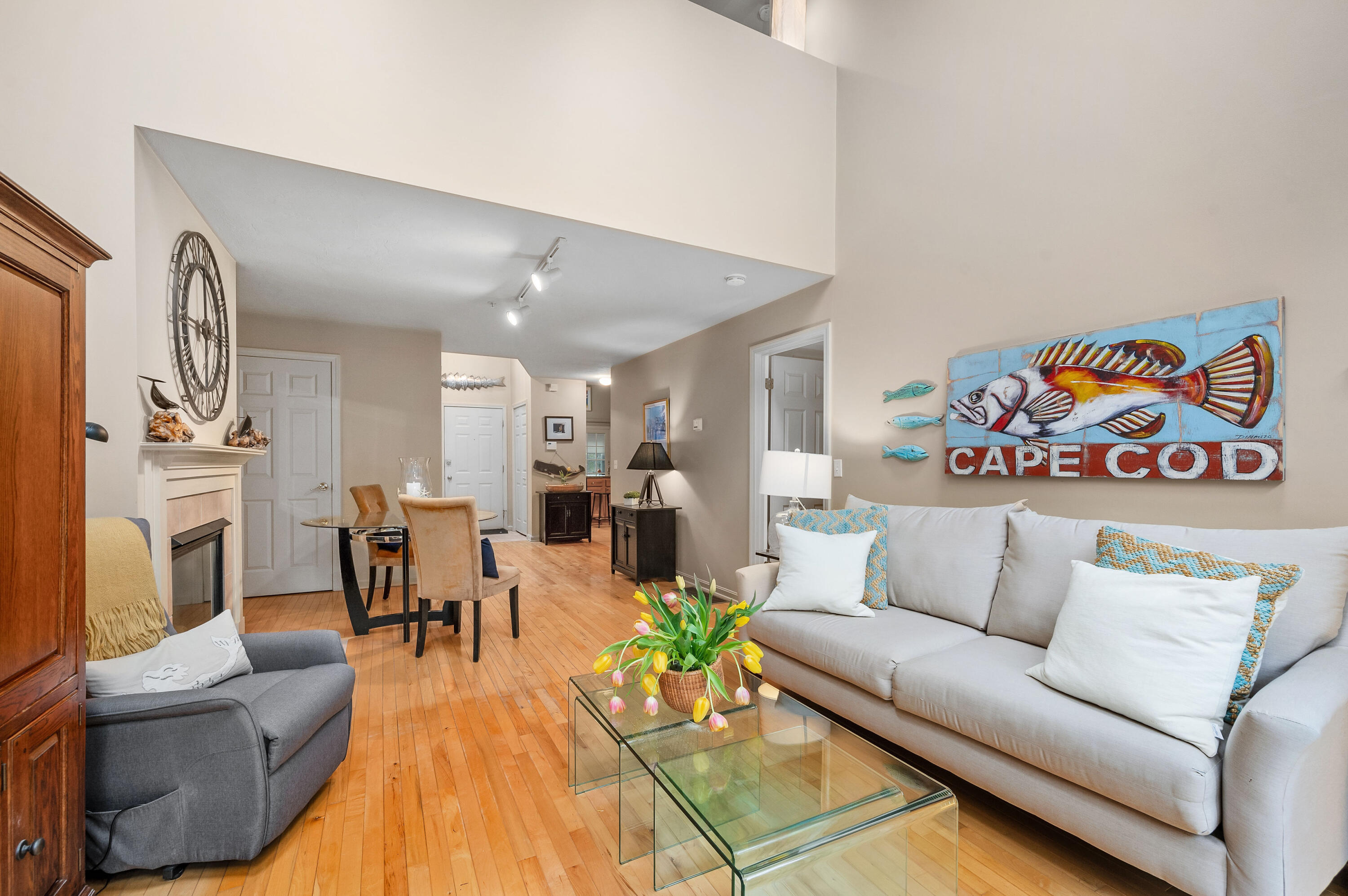 7 Red Cedar Road, Unit 7 Mashpee, MA 02649 - Photo 11 of 37 a living room with furniture and a fireplace