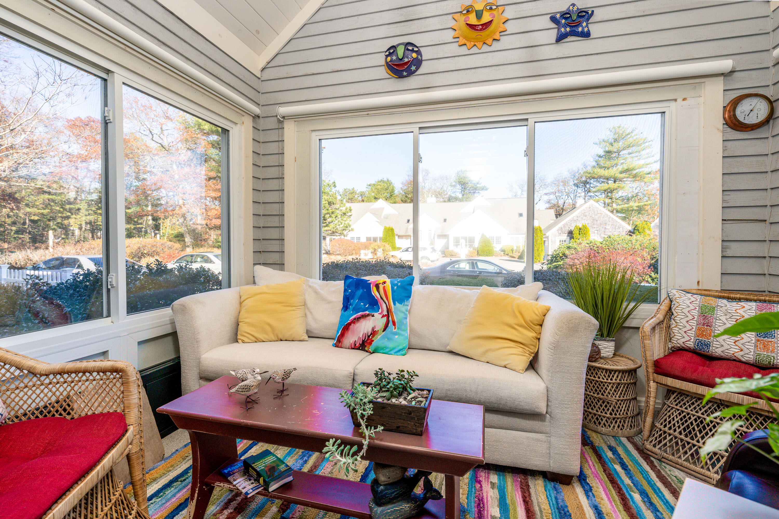 7 Red Cedar Road, Unit 7 Mashpee, MA 02649 - Photo 23 of 37 a living room with furniture and a large window
