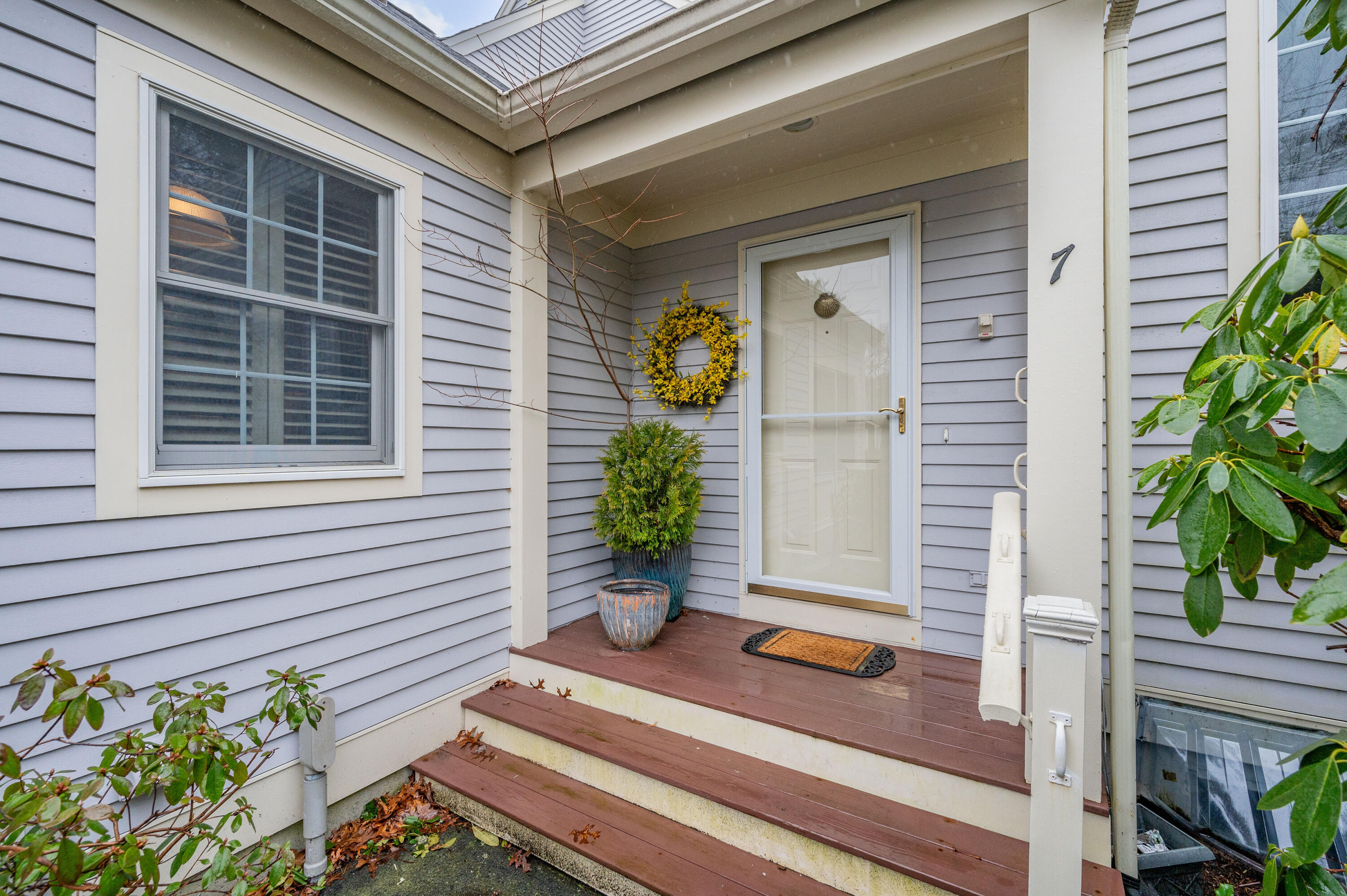 7 Red Cedar Road, Unit 7 Mashpee, MA 02649 - Photo 4 of 37 a view of a house with a door and wooden floor