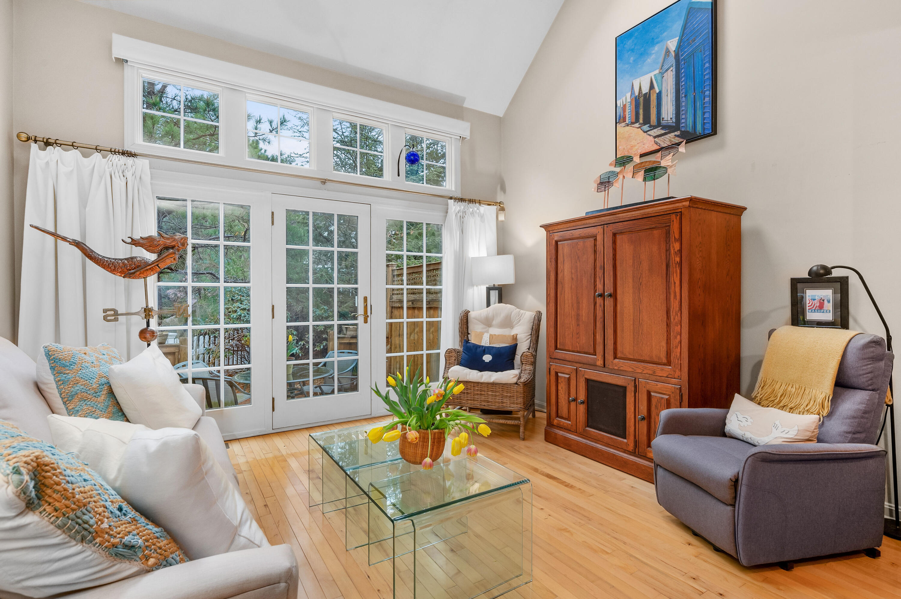 7 Red Cedar Road, Unit 7 Mashpee, MA 02649 - Photo 9 of 37 a living room with furniture and a window