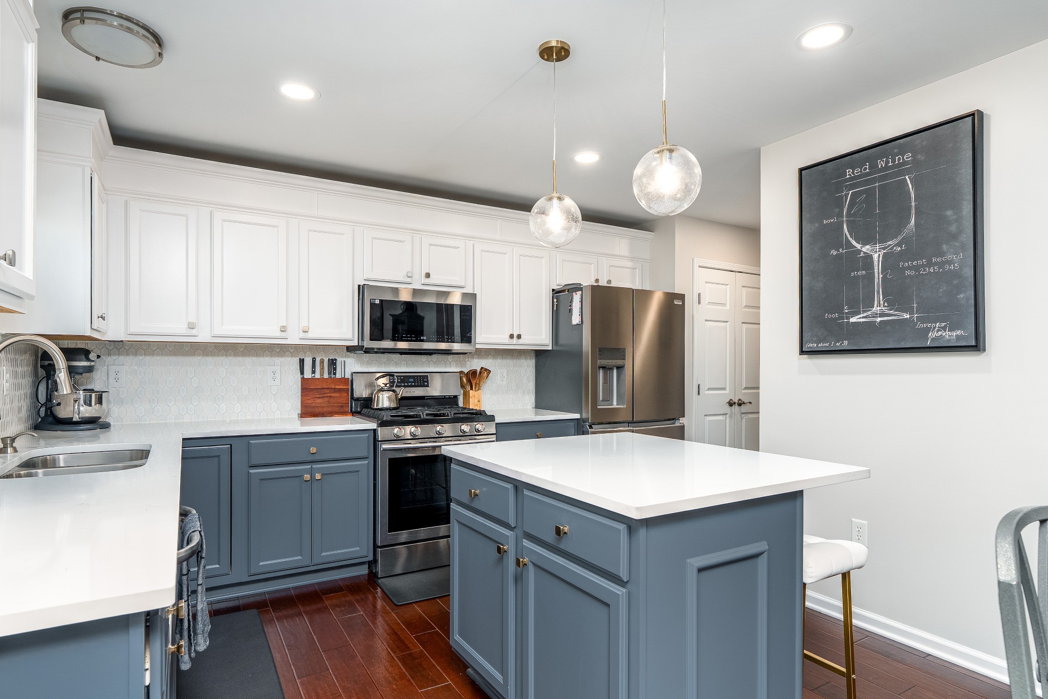 2102 Burgess Lane Spring Hill, TN 37174 - Photo 5 of 45 a kitchen with cabinets and stainless steel appliances