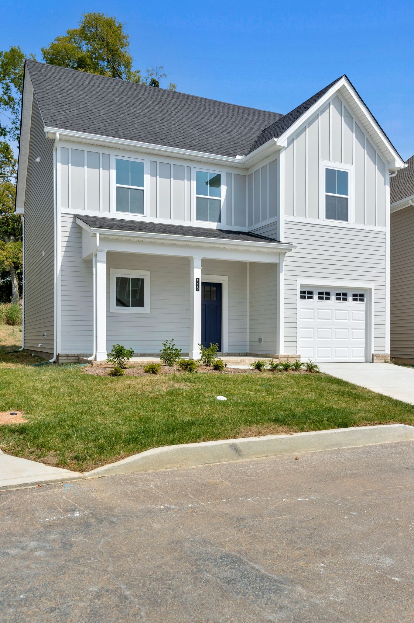 1770 Fenway Loop Antioch, TN 37013 - Photo 2 of 32 front view of a house with a yard