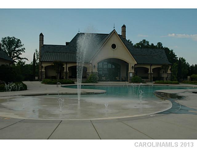 1312 Reflection Pointe Boulevard, Unit 331 Belmont, NC 28012 - Photo 11 of 11 a front view of a house with swimming pool