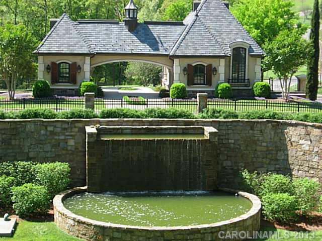 1312 Reflection Pointe Boulevard, Unit 331 Belmont, NC 28012 - Photo 4 of 11 a view of a house with a backyard