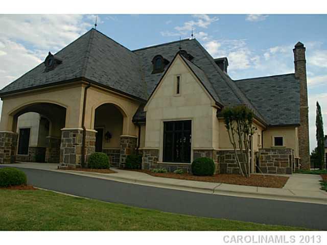 1312 Reflection Pointe Boulevard, Unit 331 Belmont, NC 28012 - Photo 9 of 11 a front view of house with yard