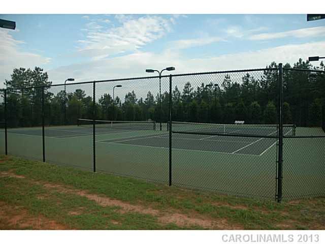 1312 Reflection Pointe Boulevard, Unit 331 Belmont, NC 28012 - Photo 10 of 11 a view of a tennis court