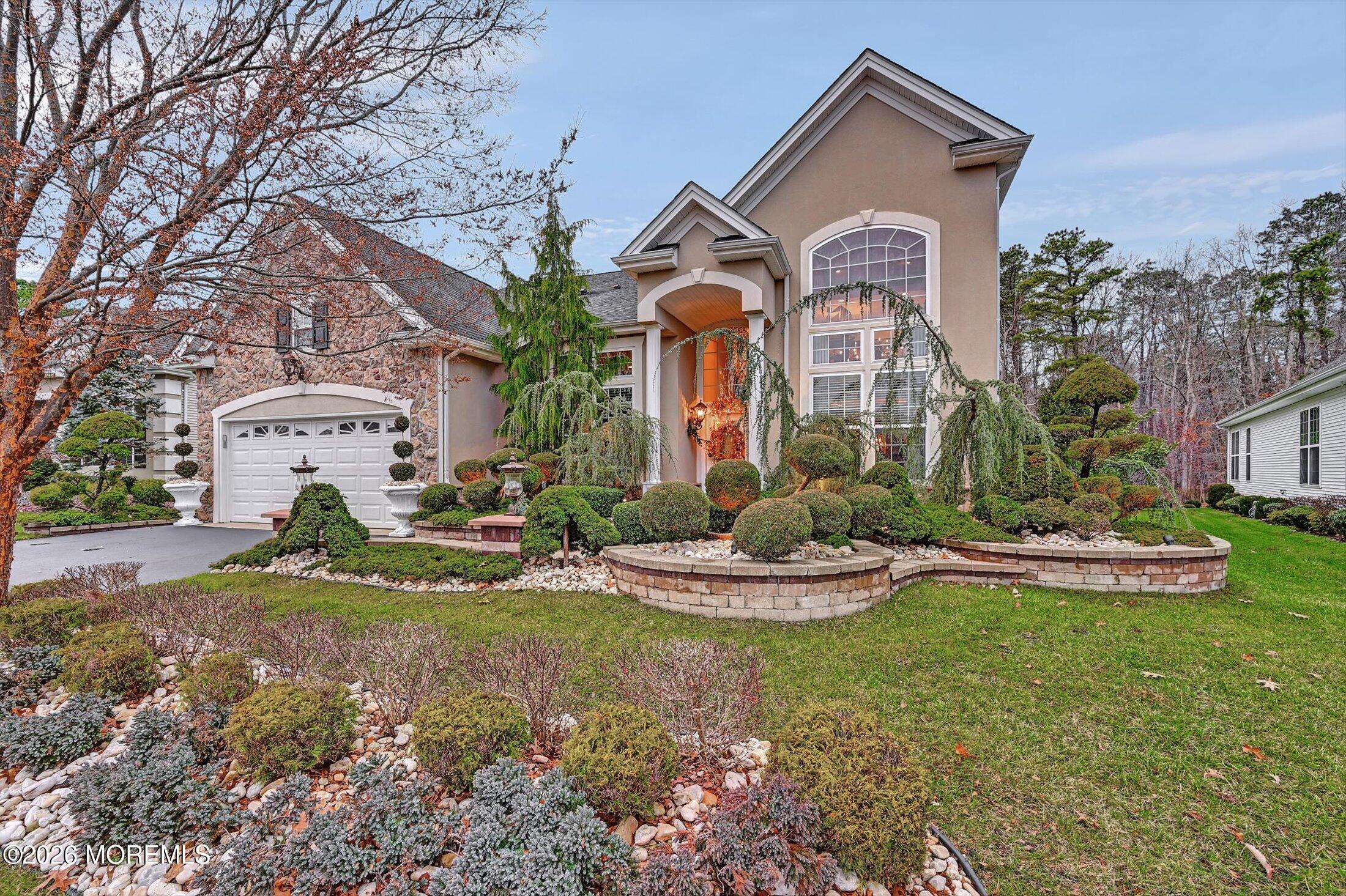 38 Park Ridge Way Jackson, NJ 08527 - Photo 7 of 22 a front view of a house with garden