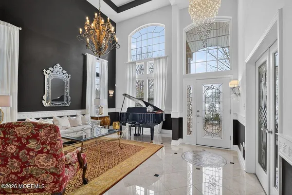 a kitchen with stainless steel appliances kitchen island granite countertop a sink and cabinets