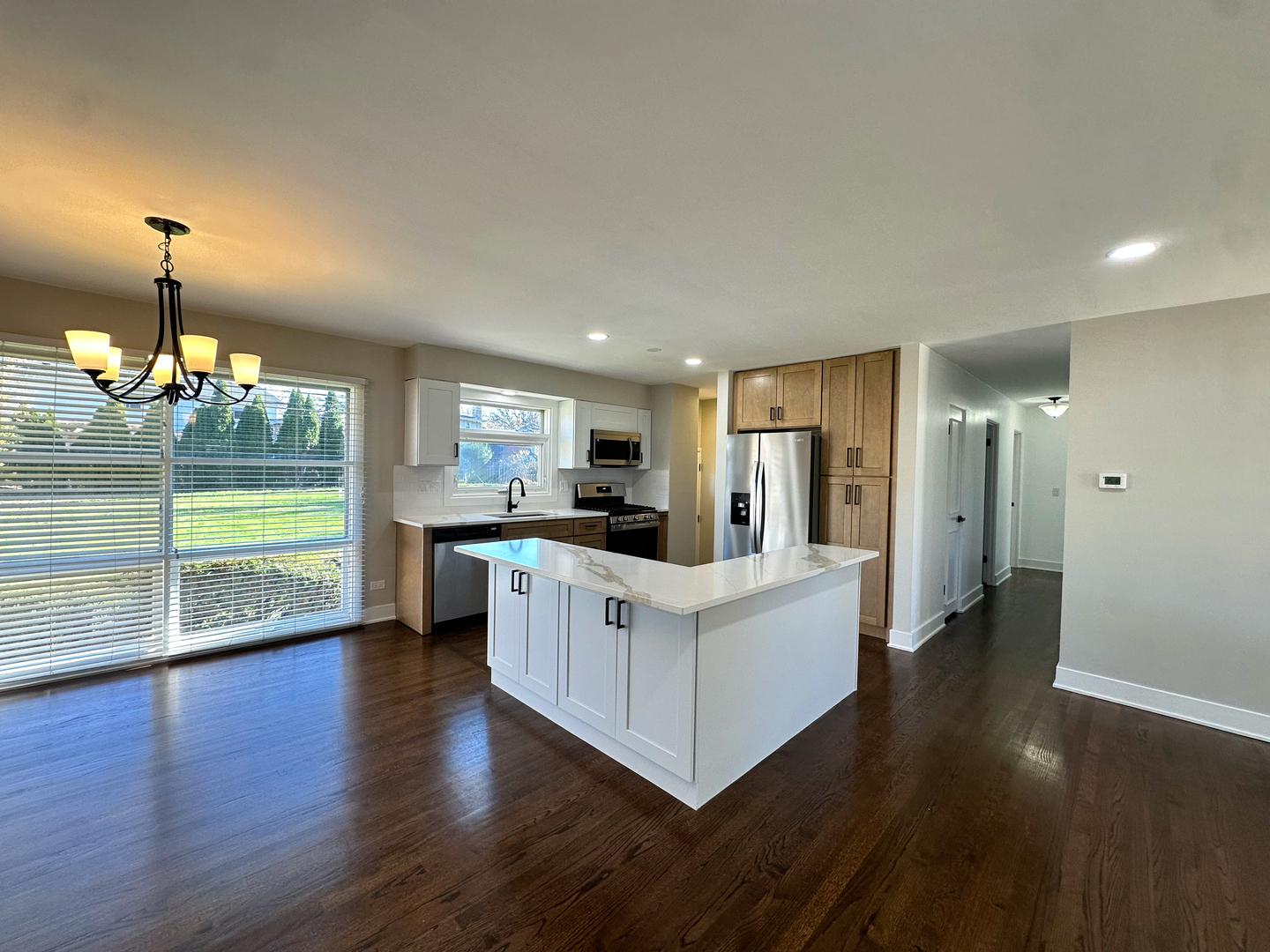 909 South Emerson Street Mount Prospect, IL 60056 - Photo 16 of 45 a view of kitchen with furniture and wooden floor