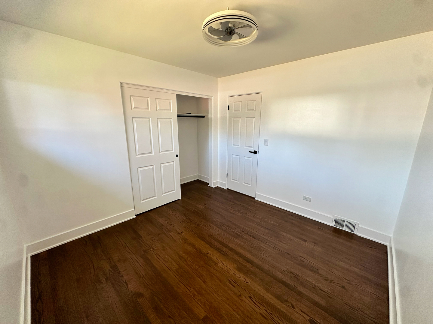 909 South Emerson Street Mount Prospect, IL 60056 - Photo 21 of 45 a view of empty room with wooden floor
