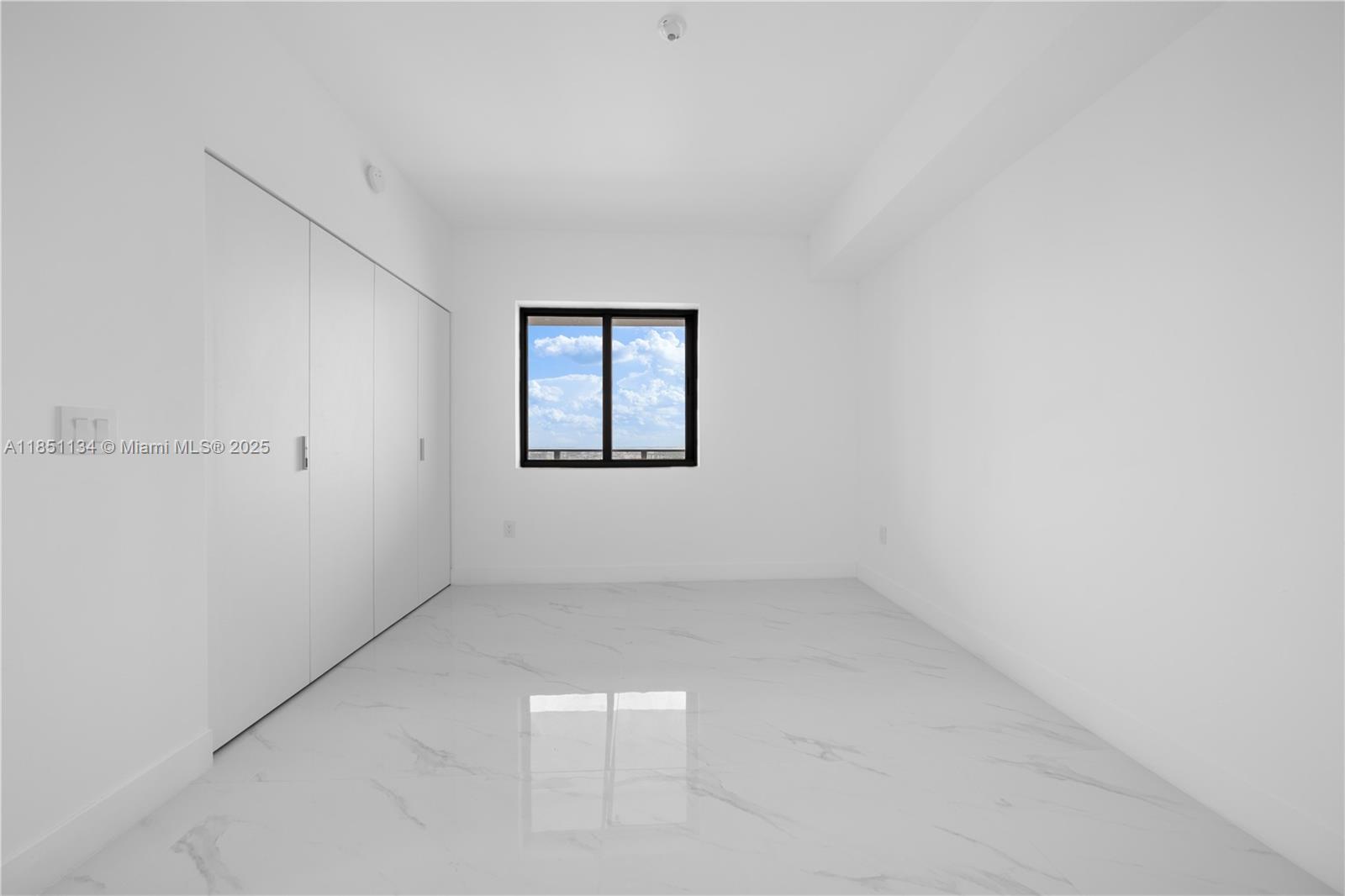 700 Northeast 24th Street, Unit 2503 Miami, FL 33137 - Photo 21 of 61 an empty room with a window