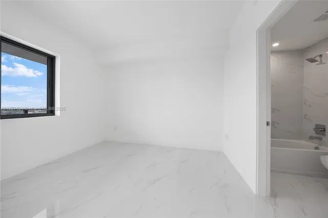 a bathroom with a toilet and sink