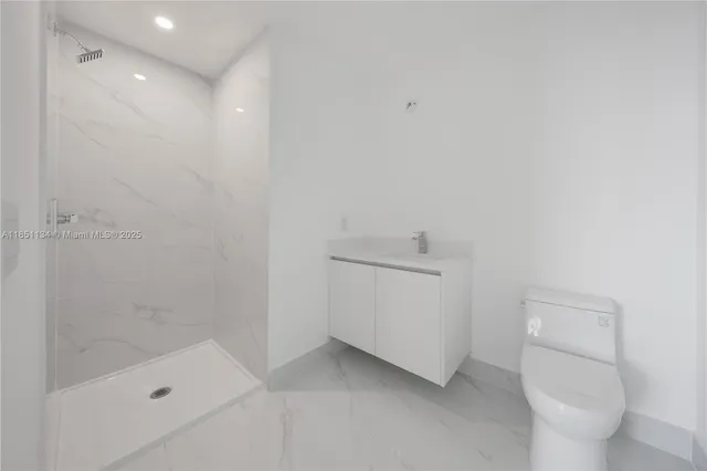 a view of a city with tall buildings