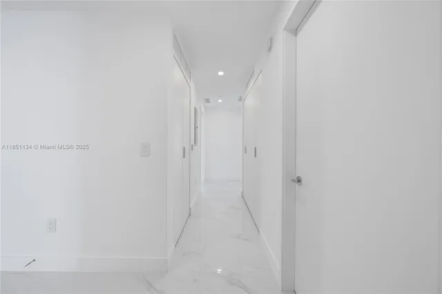 a view of a patio with couches and a fire pit