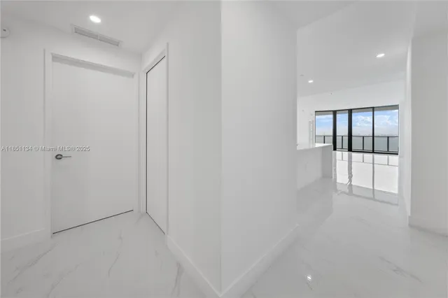 a swimming pool with outdoor seating and yard