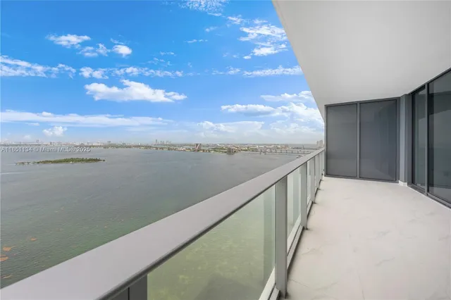 a view of a lake from a balcony