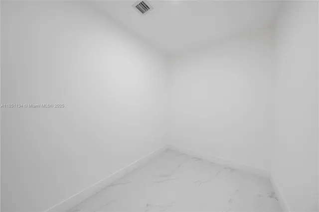 a view of a living room and dining room