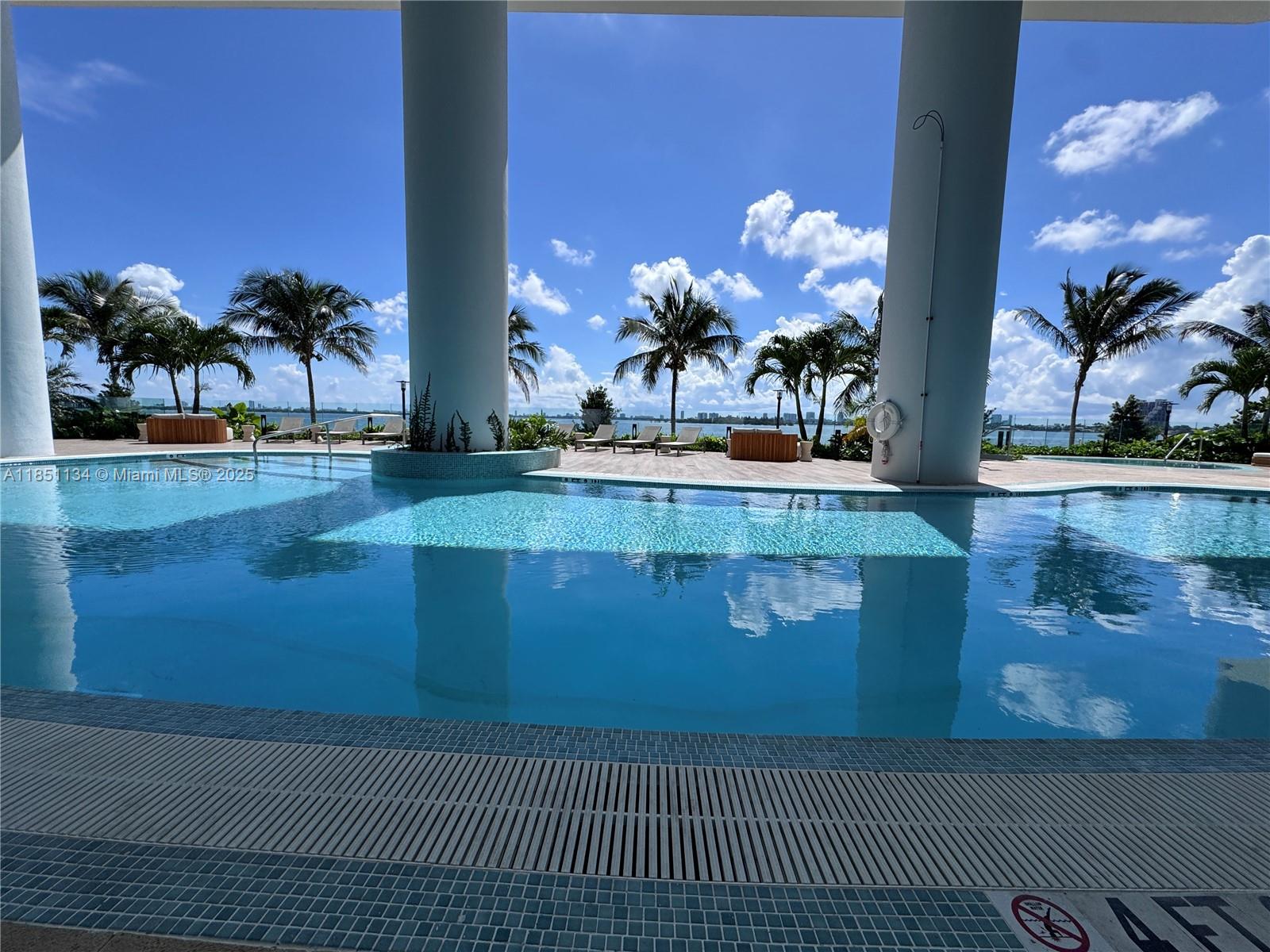 700 Northeast 24th Street, Unit 2503 Miami, FL 33137 - Photo 50 of 61 a view of a house with a swimming pool