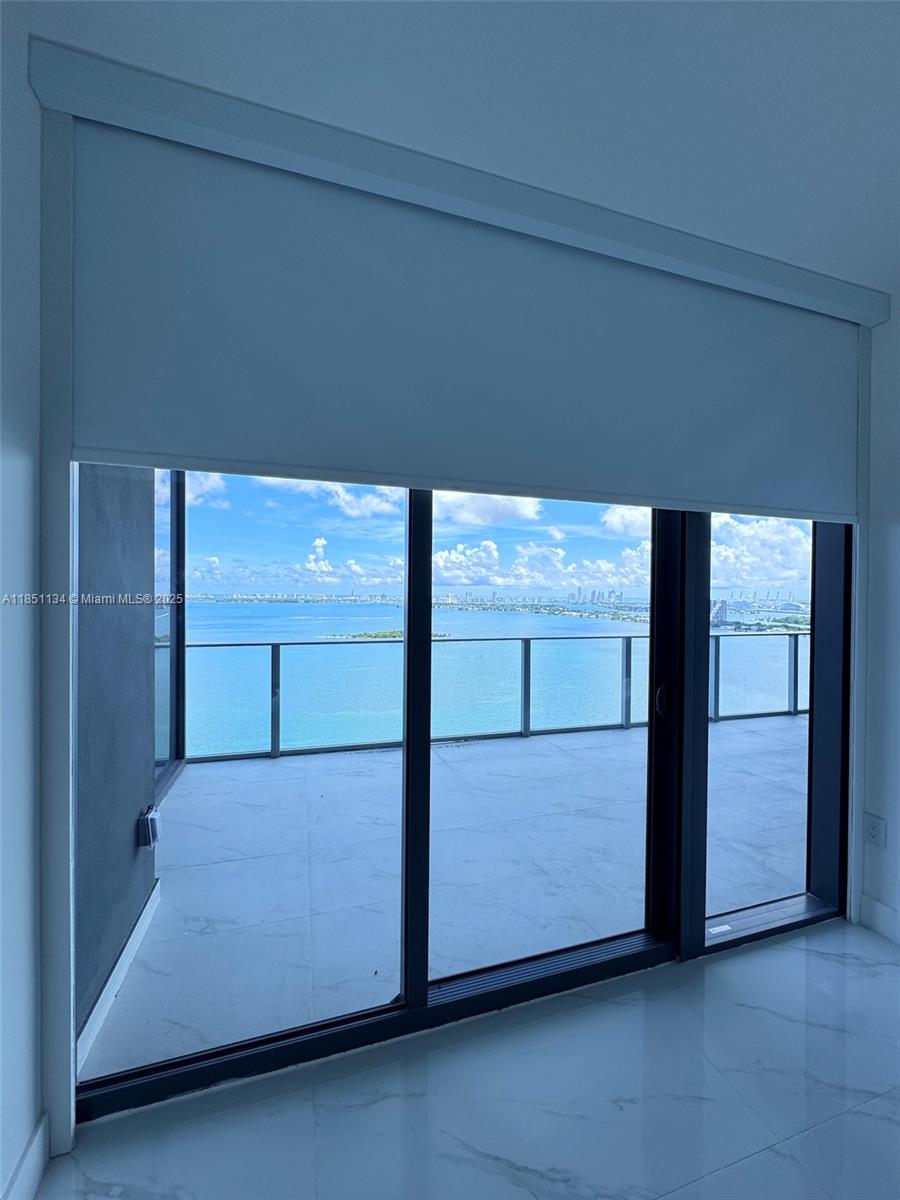 700 Northeast 24th Street, Unit 2503 Miami, FL 33137 - Photo 5 of 61 a view of an empty room and window