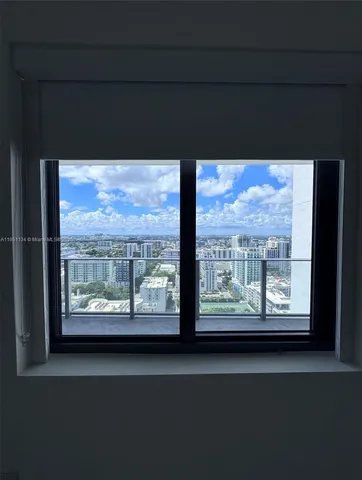 a view of a large window with outside view
