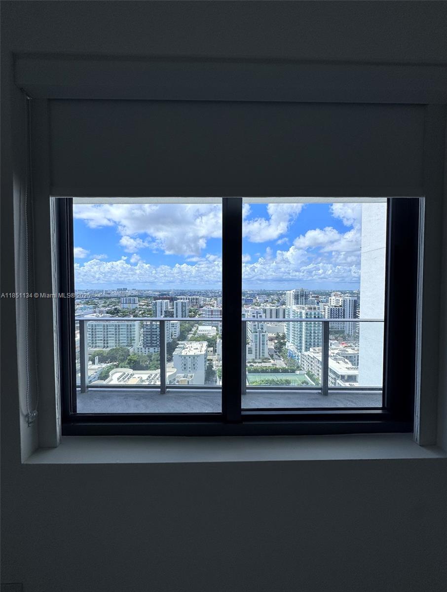 700 Northeast 24th Street, Unit 2503 Miami, FL 33137 - Photo 6 of 61 a view of a large window with outside view