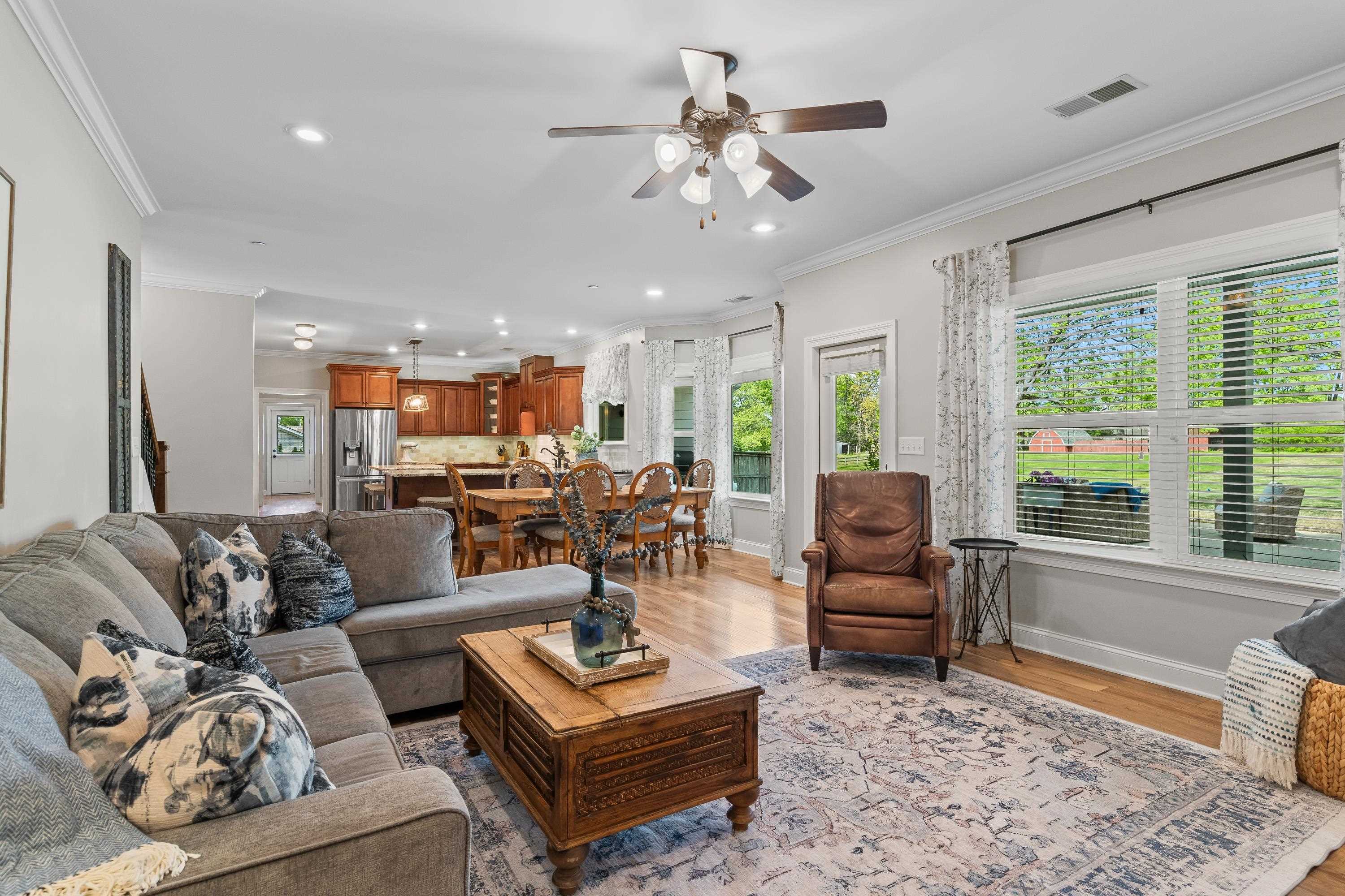 210 Poplar Acres Road Piperton, TN 38017 - Photo 15 of 40 a living room with furniture and a large window