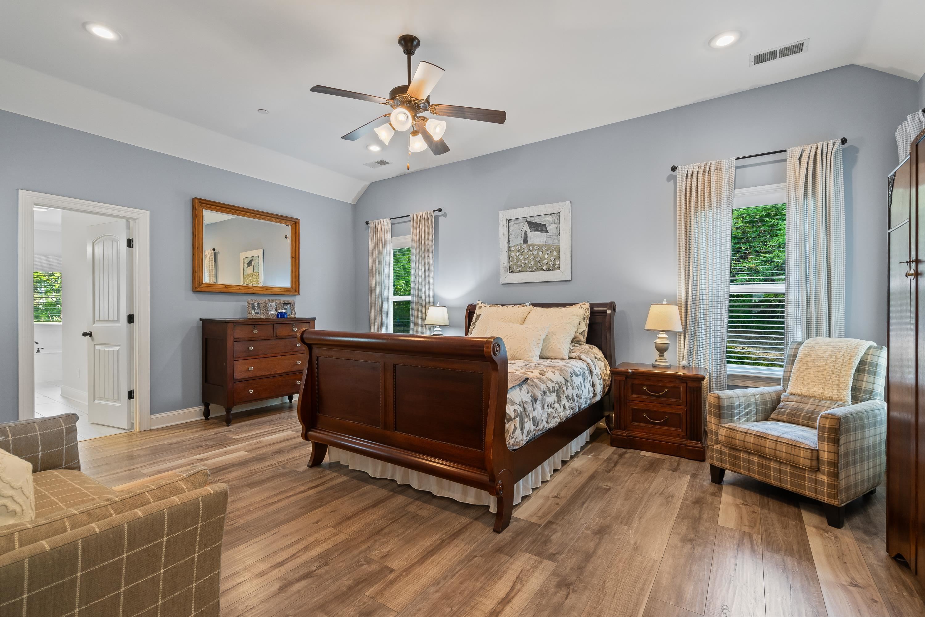 210 Poplar Acres Road Piperton, TN 38017 - Photo 18 of 40 a bedroom with furniture and wooden floor