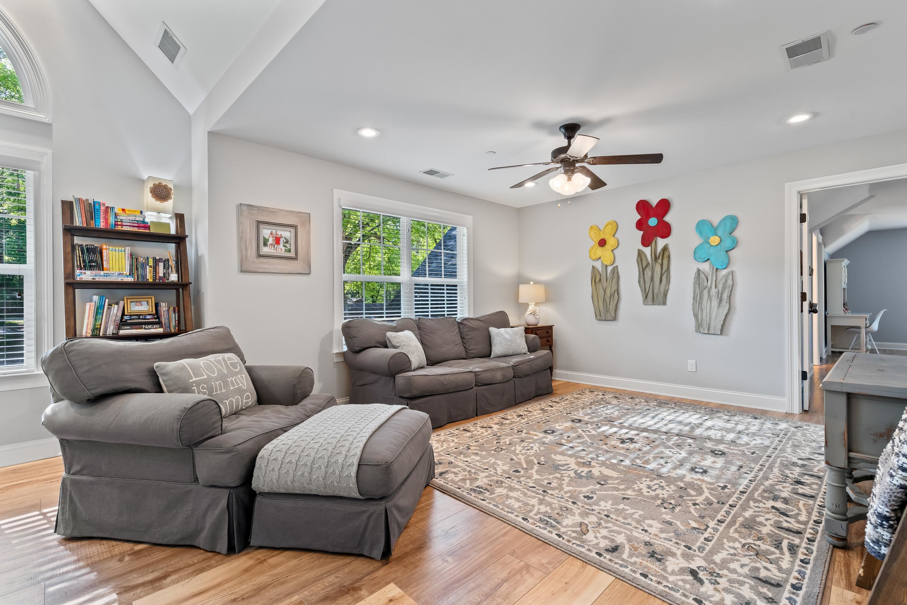 210 Poplar Acres Road Piperton, TN 38017 - Photo 30 of 40 a living room with furniture ceiling fan and a rug