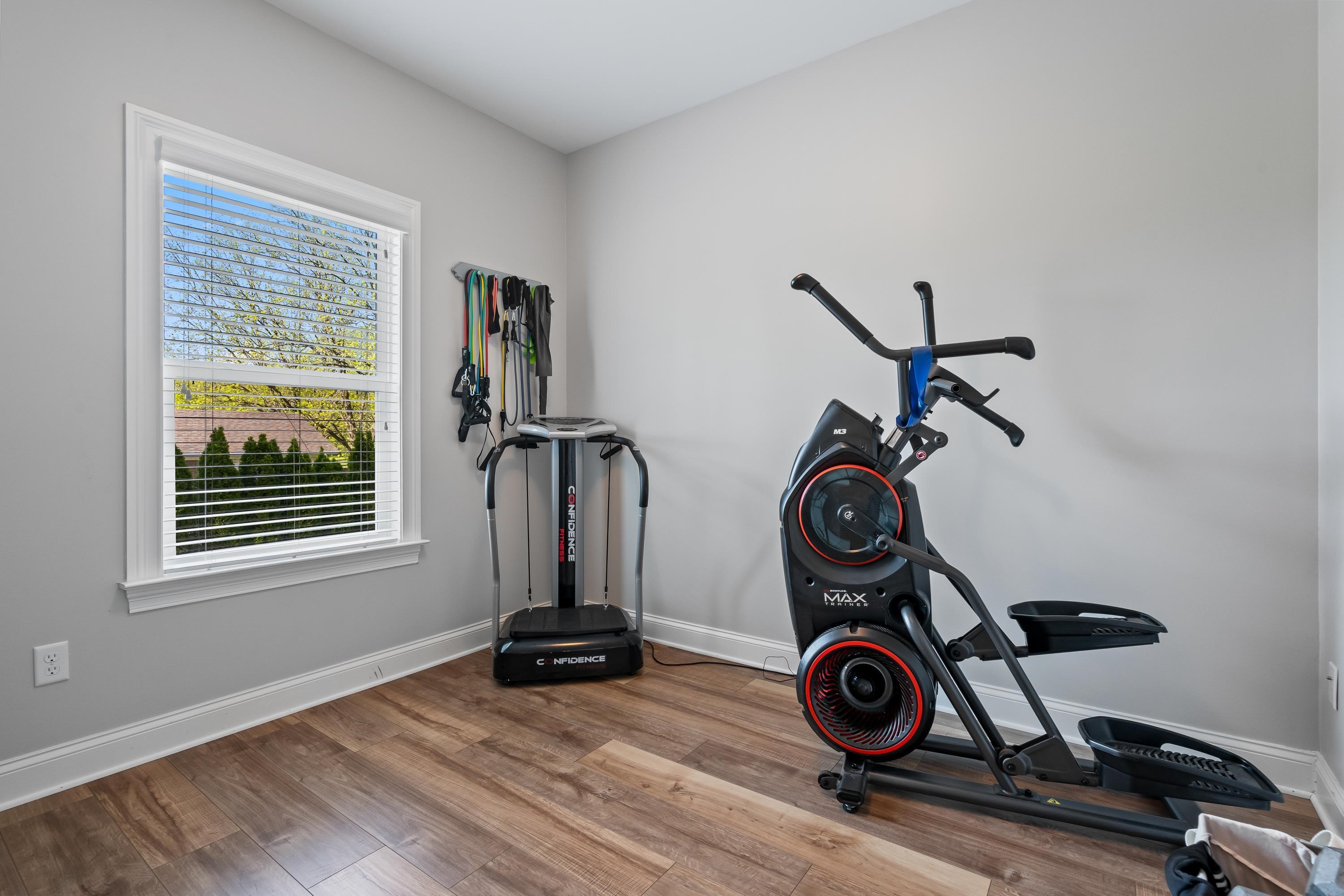 210 Poplar Acres Road Piperton, TN 38017 - Photo 32 of 40 a view of that has washing machine and wooden floor