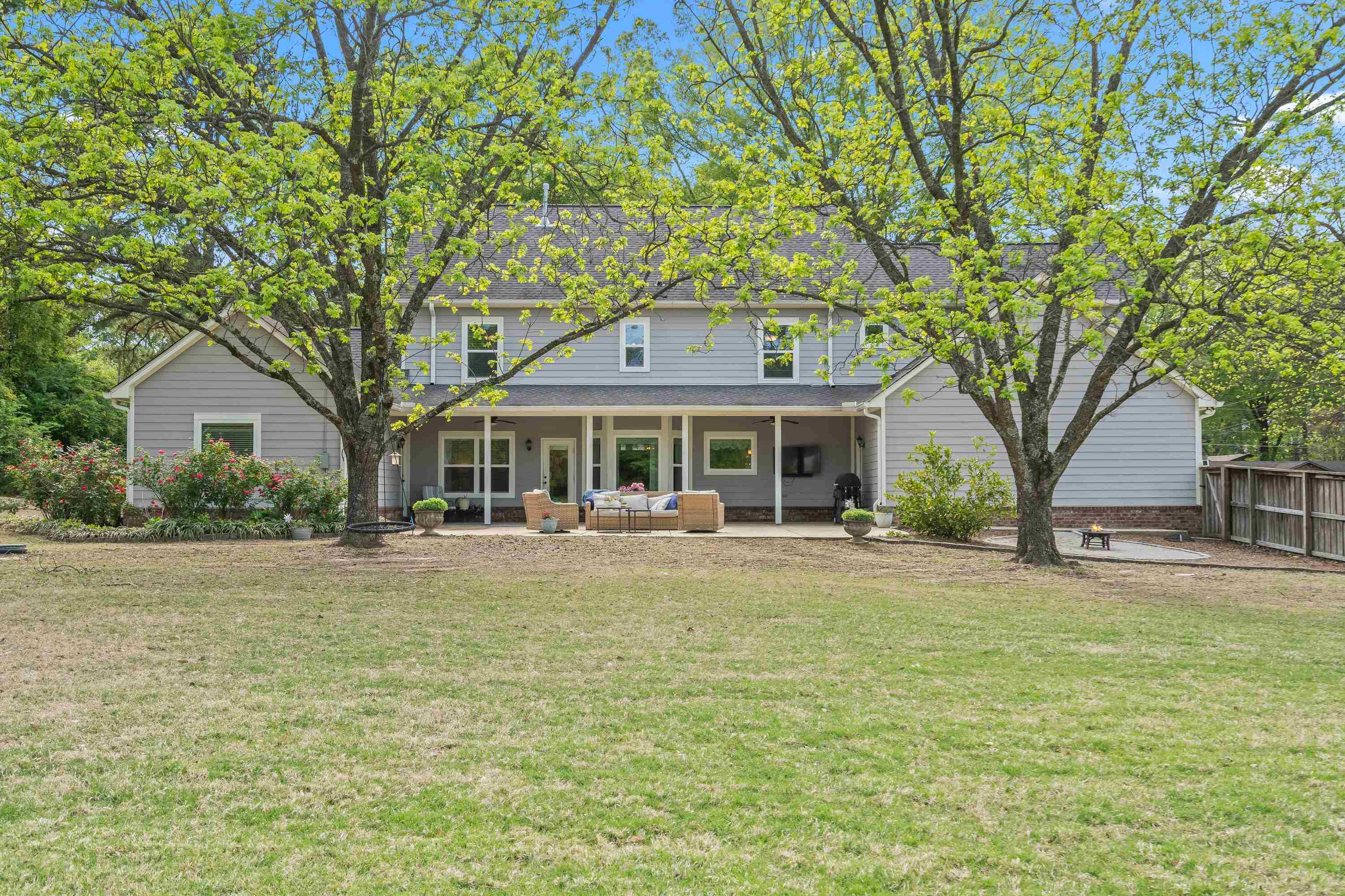210 Poplar Acres Road Piperton, TN 38017 - Photo 34 of 40 a front view of a house with a garden