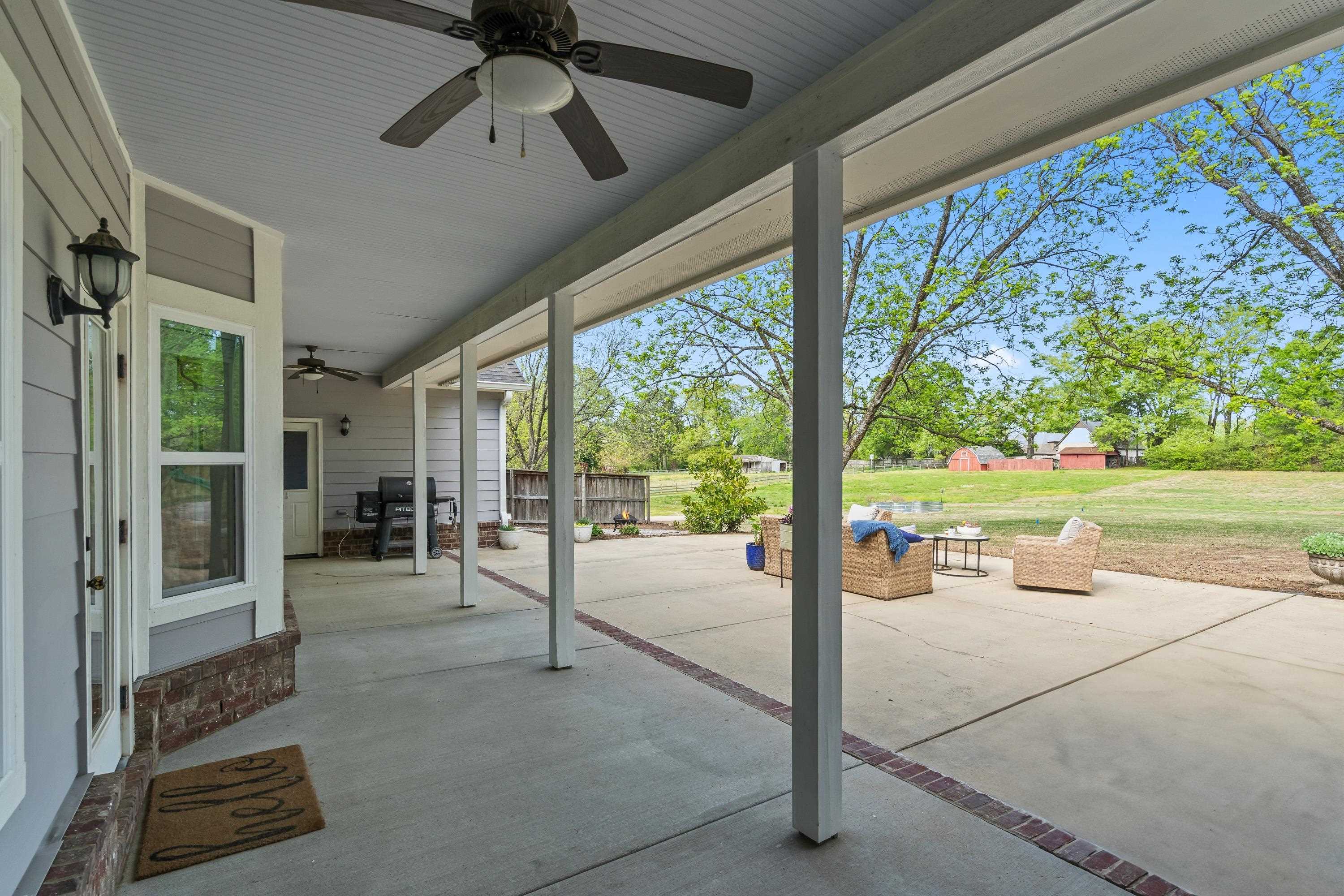 210 Poplar Acres Road Piperton, TN 38017 - Photo 36 of 40 a building outdoor space with seating