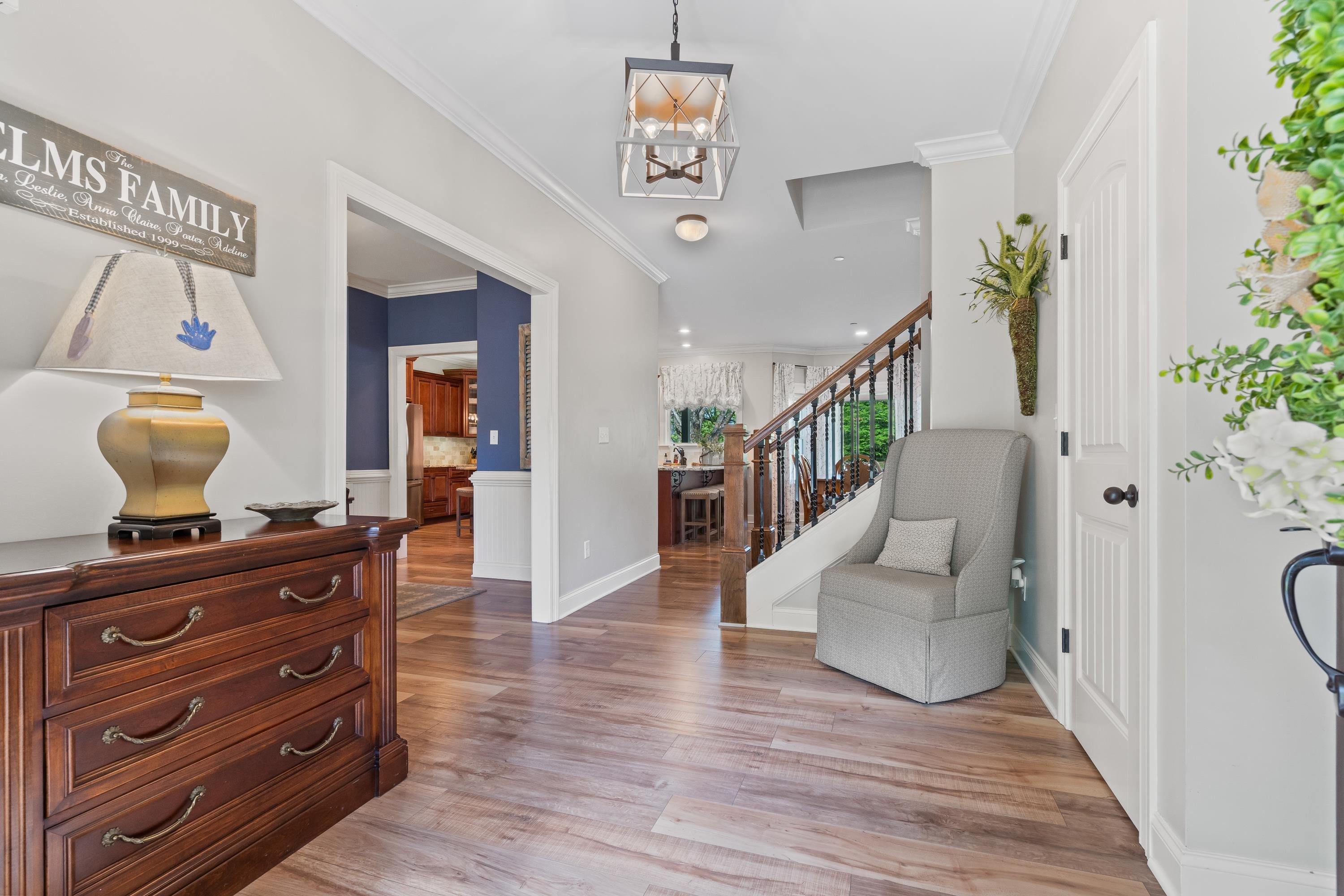 210 Poplar Acres Road Piperton, TN 38017 - Photo 9 of 40 a living room with furniture and a mirror