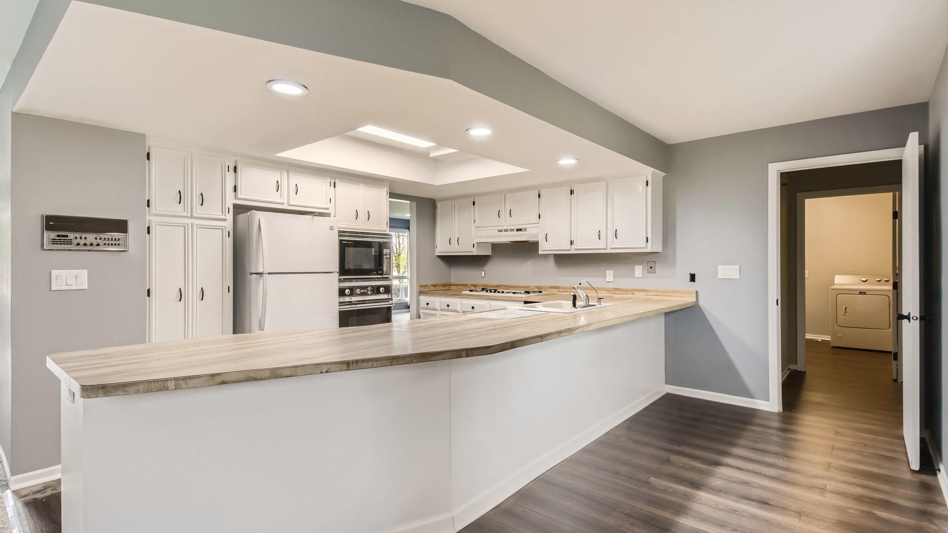 16156 Weber Road Crest Hill, IL 60403 - Photo 12 of 39 a large kitchen with stainless steel appliances a refrigerator and a stove top oven