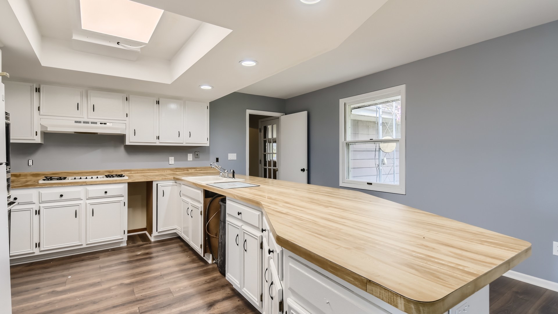 16156 Weber Road Crest Hill, IL 60403 - Photo 14 of 39 a kitchen with granite countertop white cabinets and white appliances