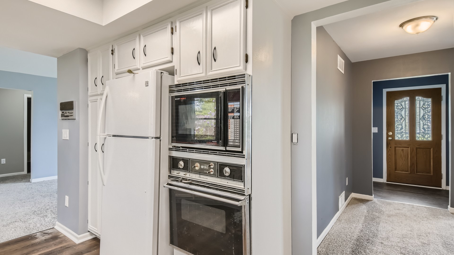 16156 Weber Road Crest Hill, IL 60403 - Photo 15 of 39 a kitchen with cabinets and stainless steel appliances