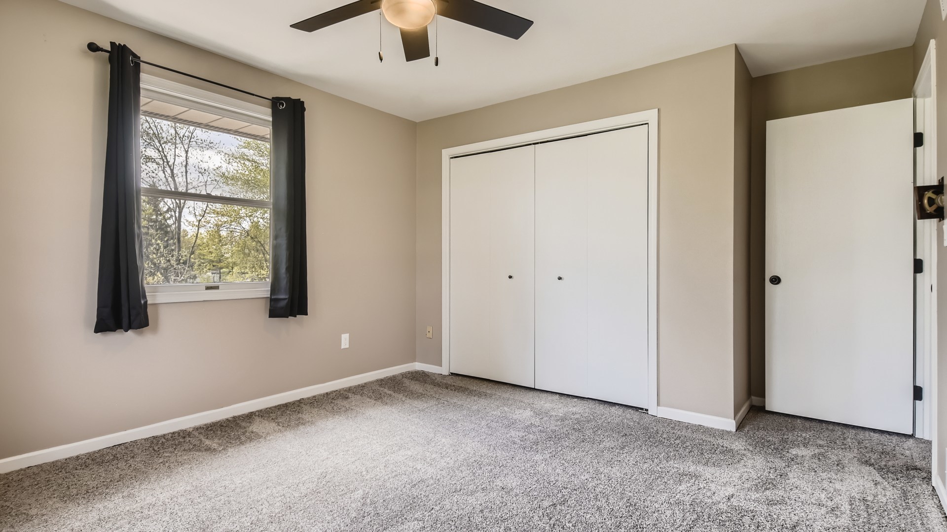 16156 Weber Road Crest Hill, IL 60403 - Photo 25 of 39 a view of an empty room with a window