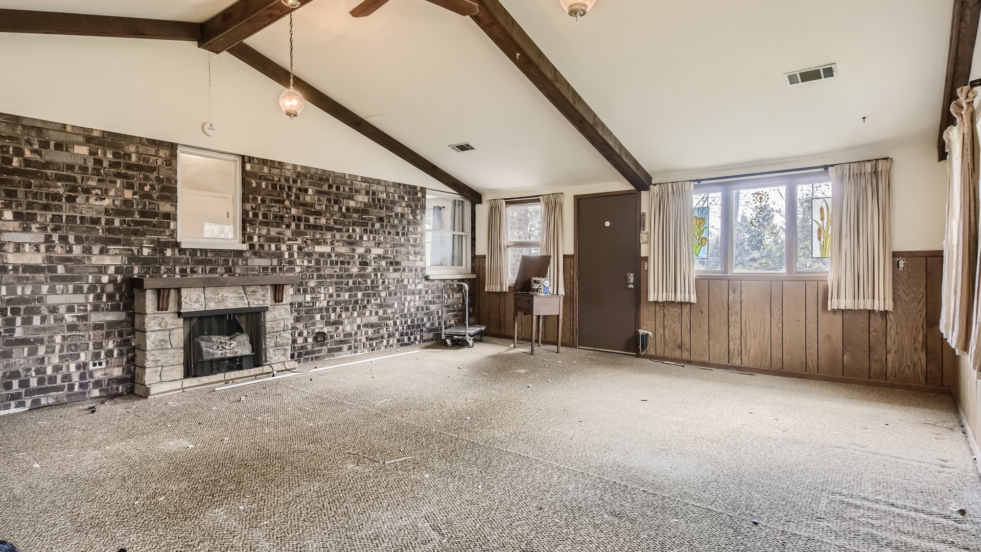 16156 Weber Road Crest Hill, IL 60403 - Photo 32 of 39 a view of a livingroom with an empty space and a fireplace
