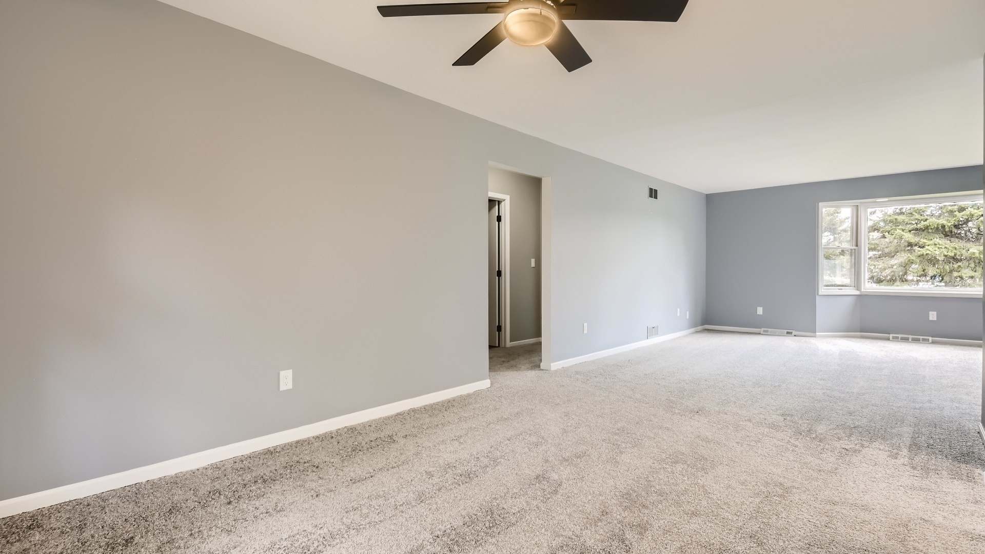 16156 Weber Road Crest Hill, IL 60403 - Photo 8 of 39 an empty room with a empty space and a ceiling fan