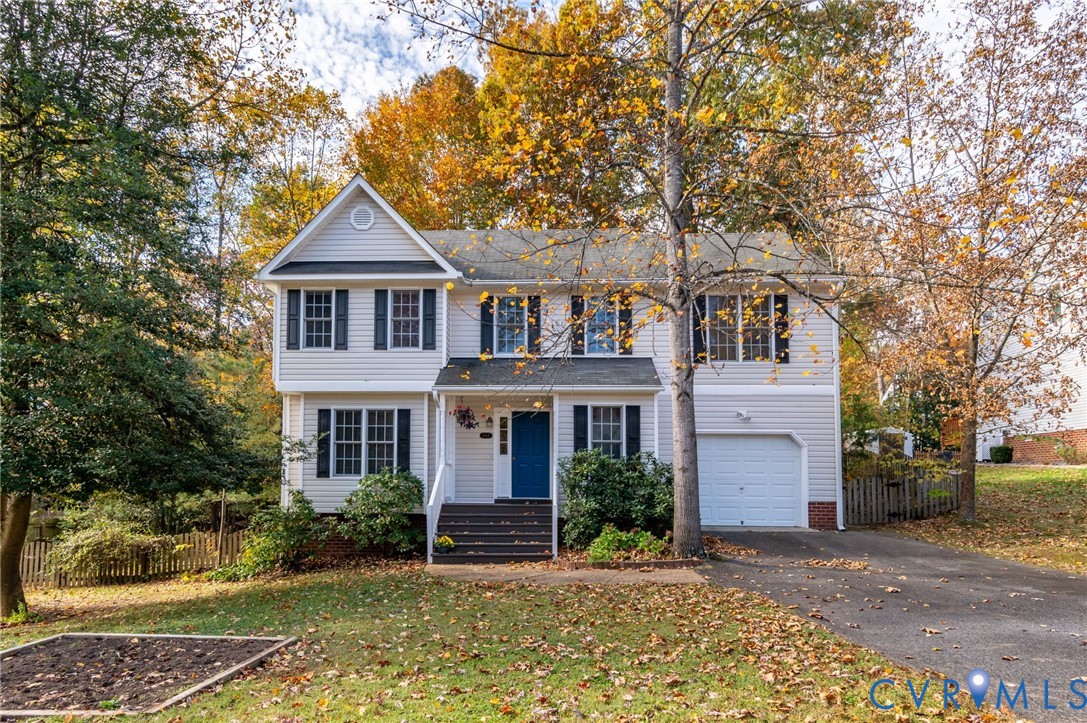 1918 Castle Glen Drive Chesterfield, VA 23236 - Photo 1 of 33 a front view of a house with a yard