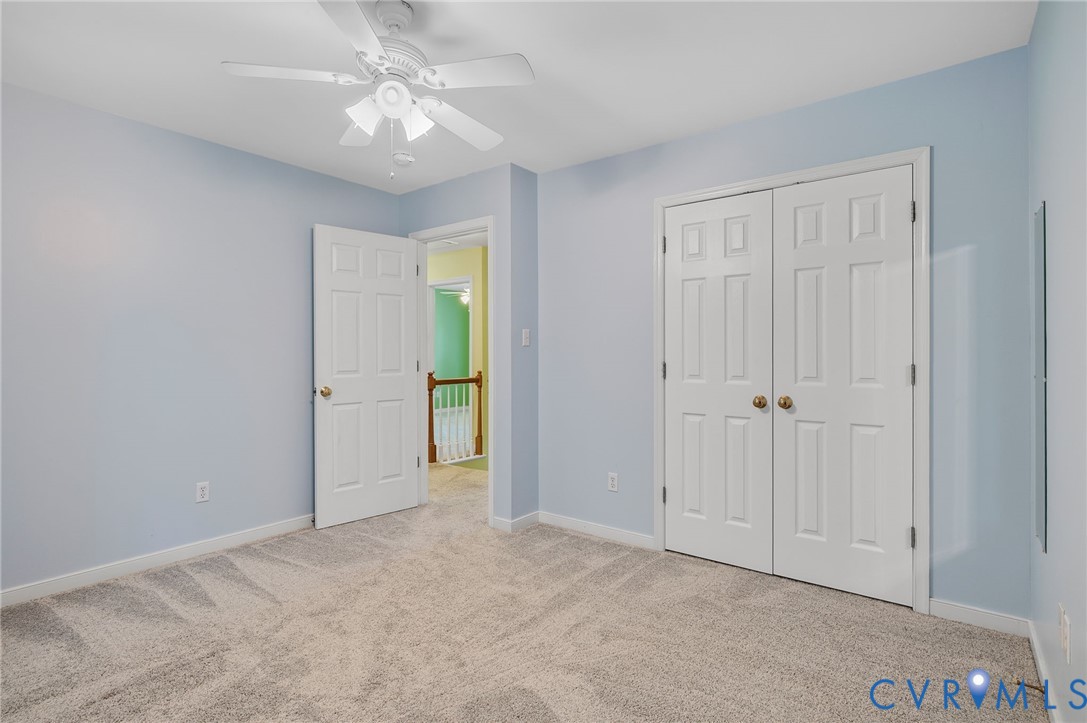 1918 Castle Glen Drive Chesterfield, VA 23236 - Photo 20 of 33 a view of an empty room and a ceiling fan window