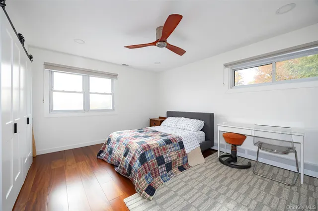 a view of front door with wooden floor