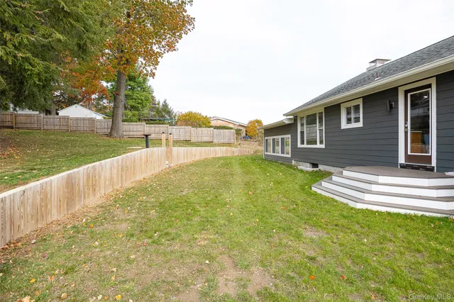 a view of backyard with green space