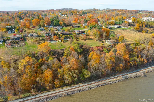 a view of residential houses with lake view