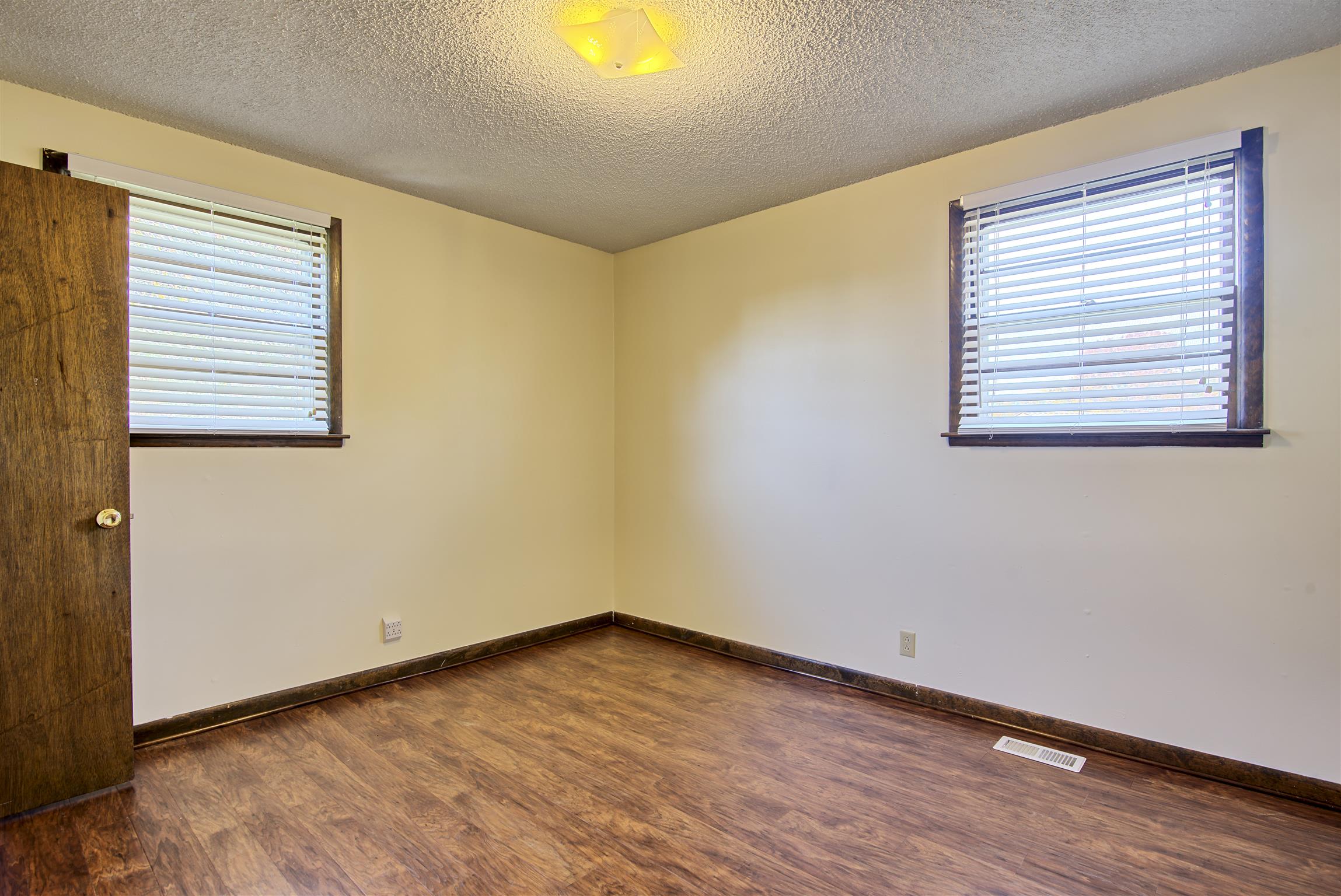 7487 Deer Ridge Road Primm Springs, TN 38476 - Photo 12 of 13 an empty room with a window