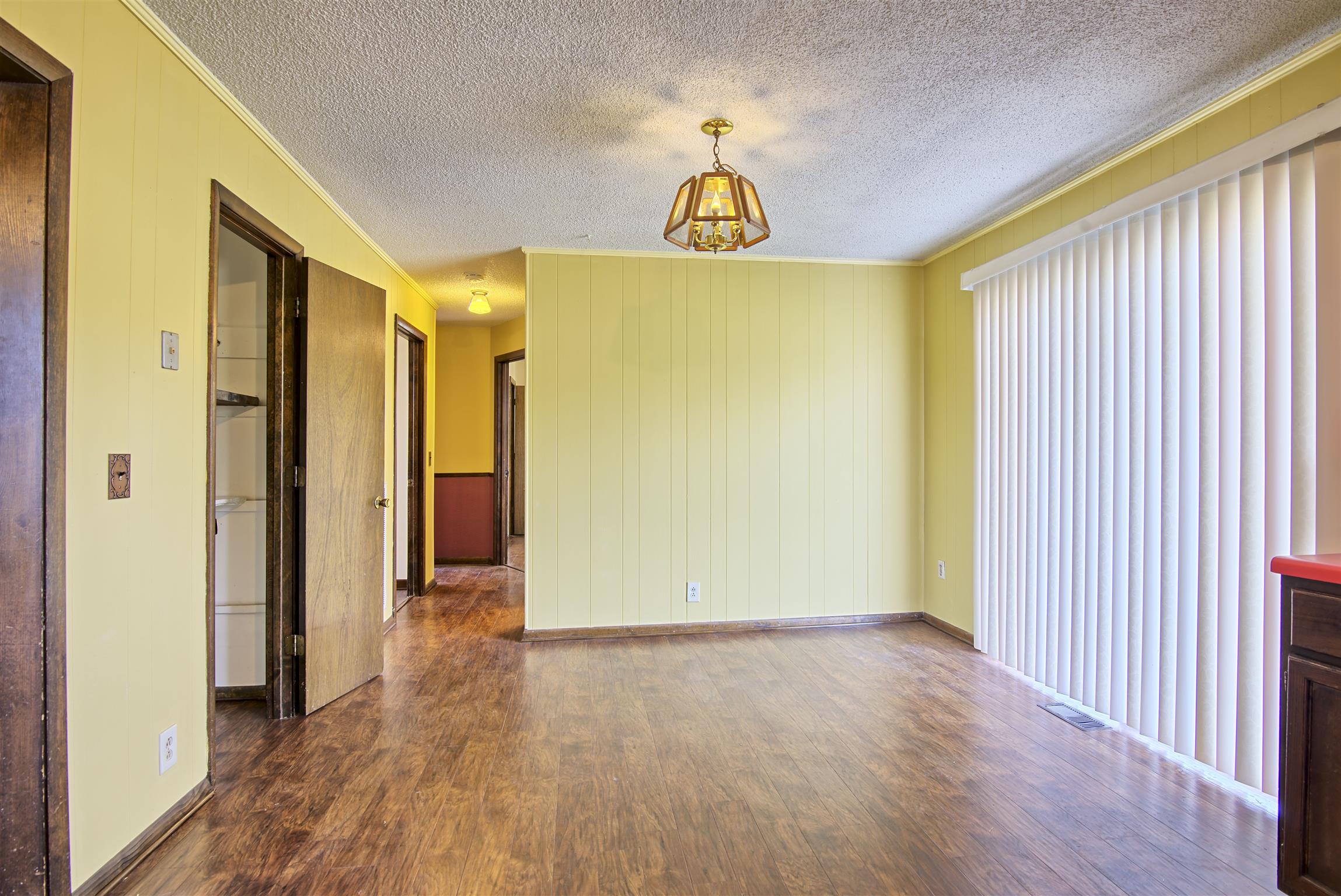7487 Deer Ridge Road Primm Springs, TN 38476 - Photo 6 of 13 a view of empty room with wooden floor